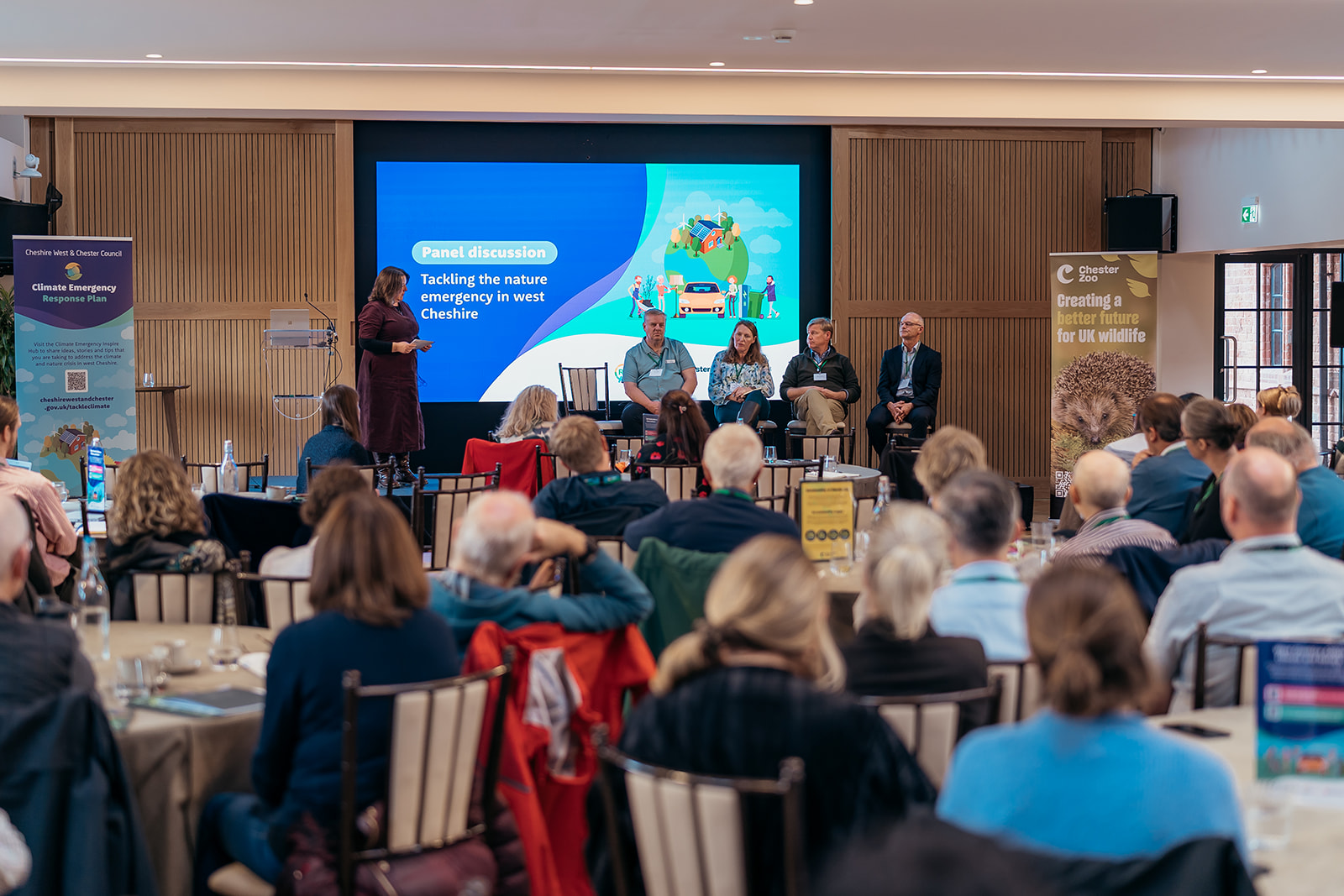 People watching a panel discussion at the event