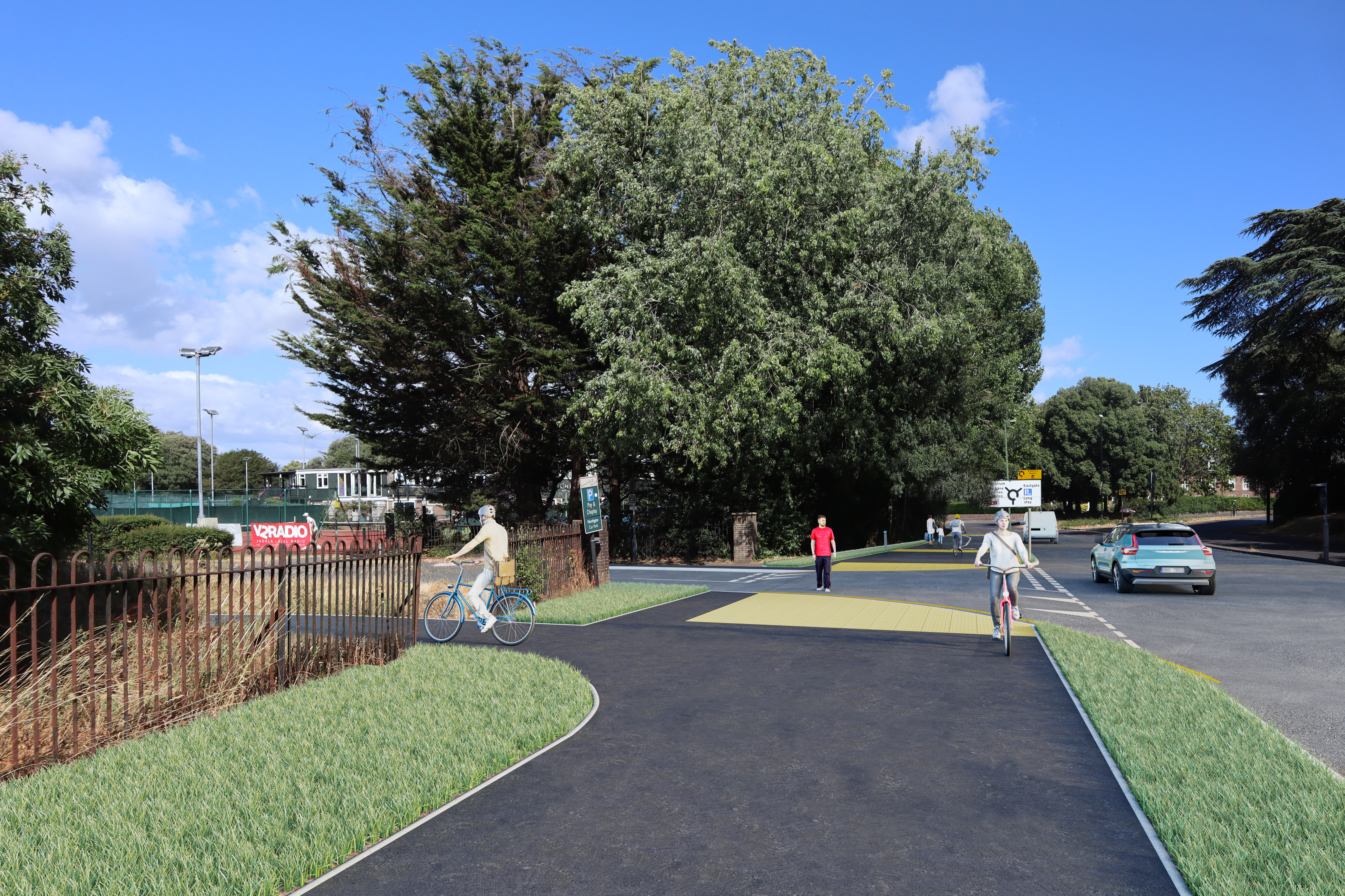 Artist impression showing what the Northgate car park access junction could look like. This shows a shared use path along Oaklands Way, with a raised table across the car park access road, and tactile paving on either side.