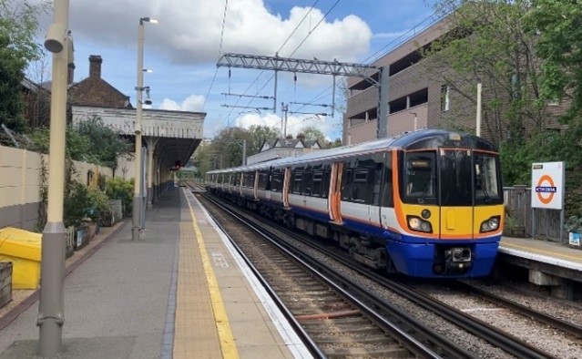 a photo of an Overground train at Acton Central