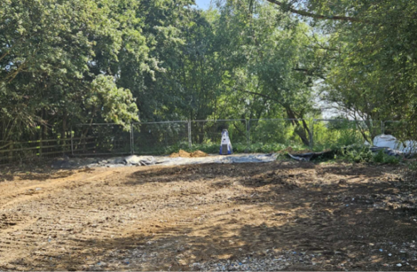 Image taken June 2026 shpwing the same location with sandbags and waste removed
