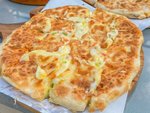 Mix Cheese with Crispy Feteer  Pizza Royal restaurant 