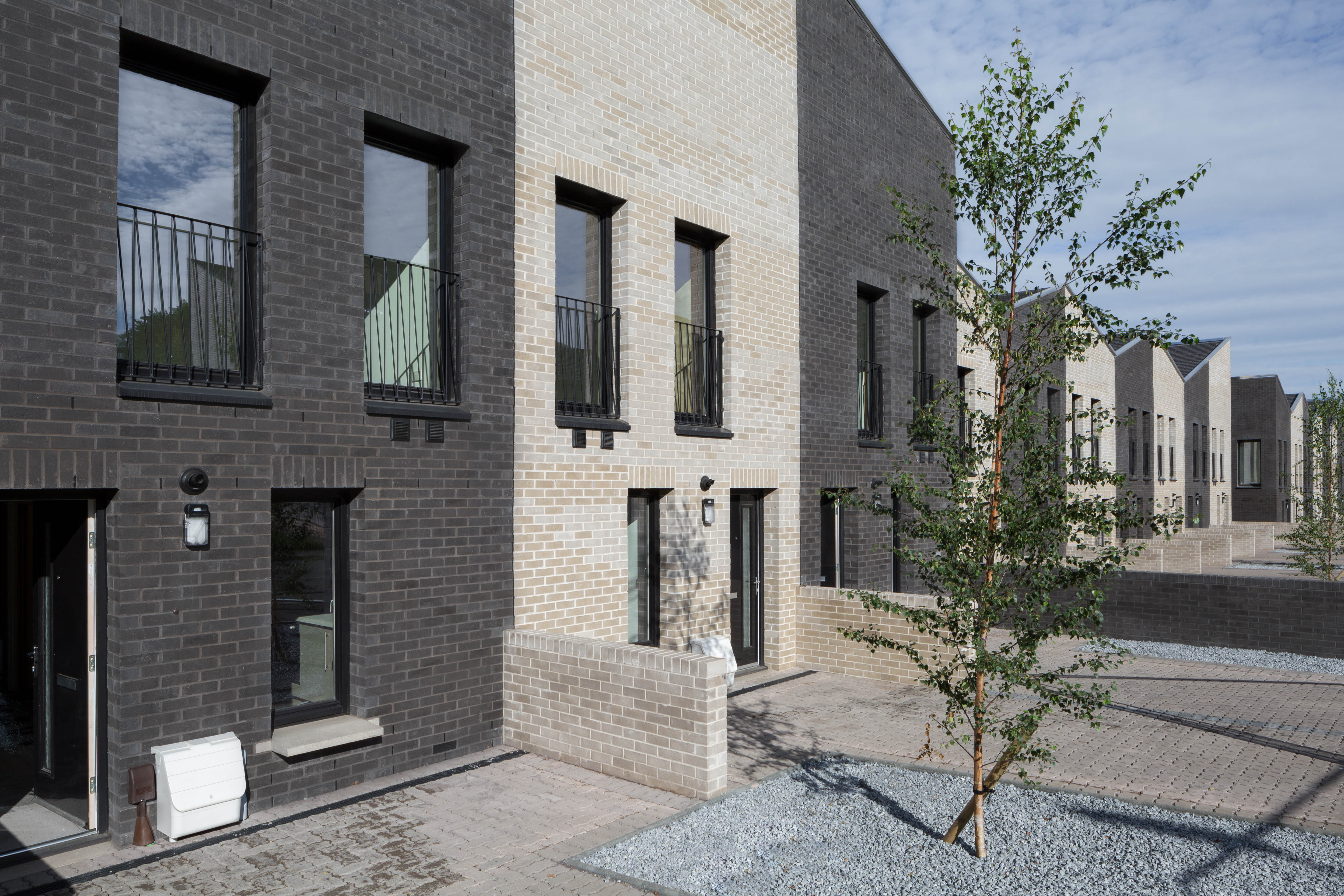 Expressive terrace McGinlay Bell completes Maryhill Locks Housing in