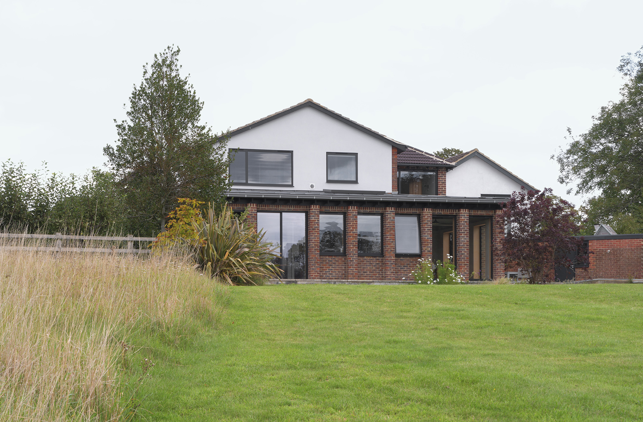 ‘Sturdy and companionable’ retrofit of 1960s Chilterns house by Cairn
