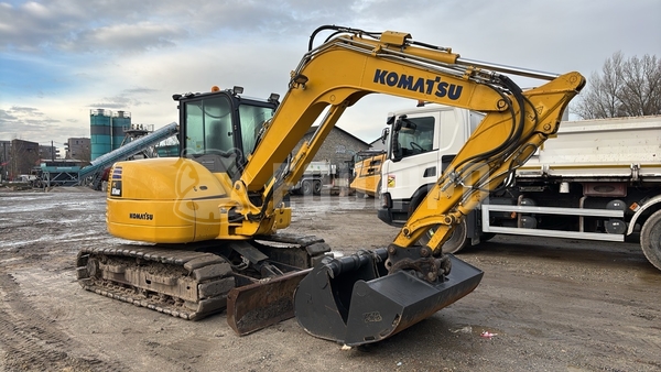 Picture of the Komatsu PC80MR-5E0 with 3 excavator buckets