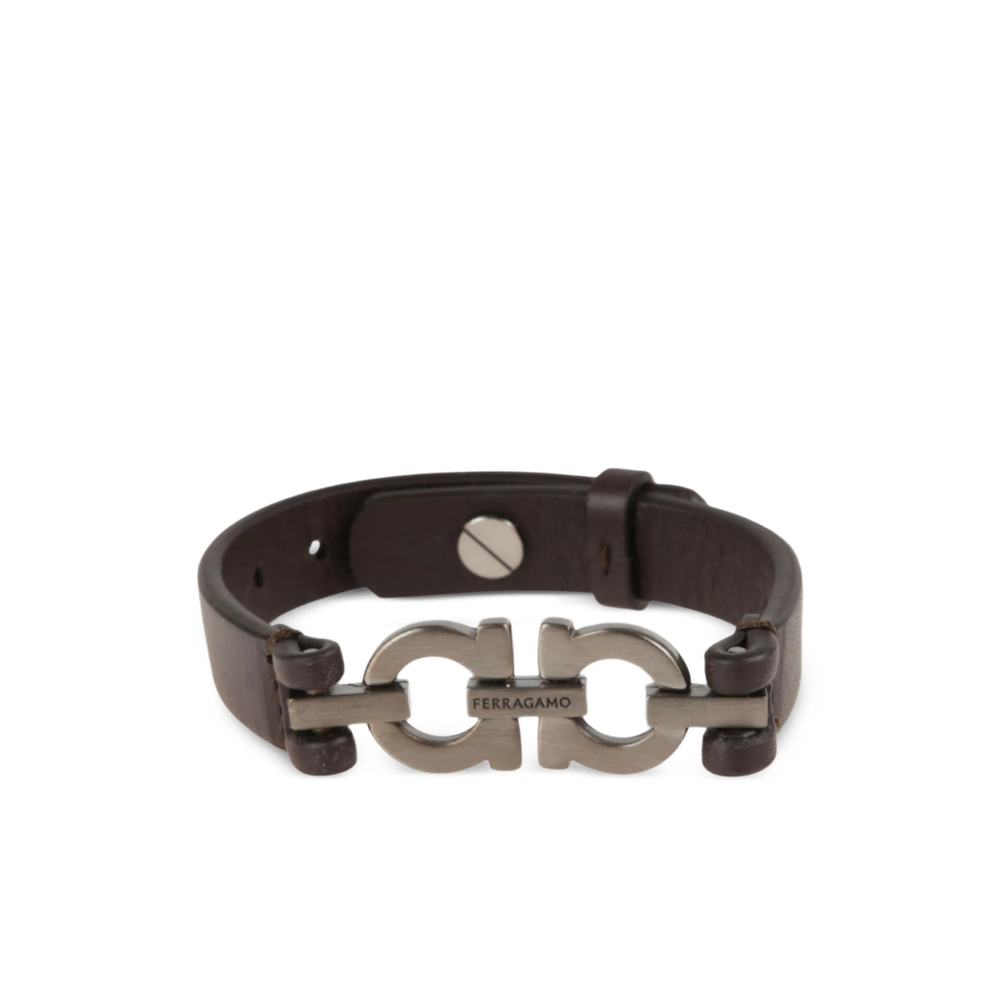 Ferragamo Bracciale Ferragamo. Design In Pelle, Decorato Con Doppio Logo Gancini In Finitura Rutenio. Chiusura Regolabile Con Perno.