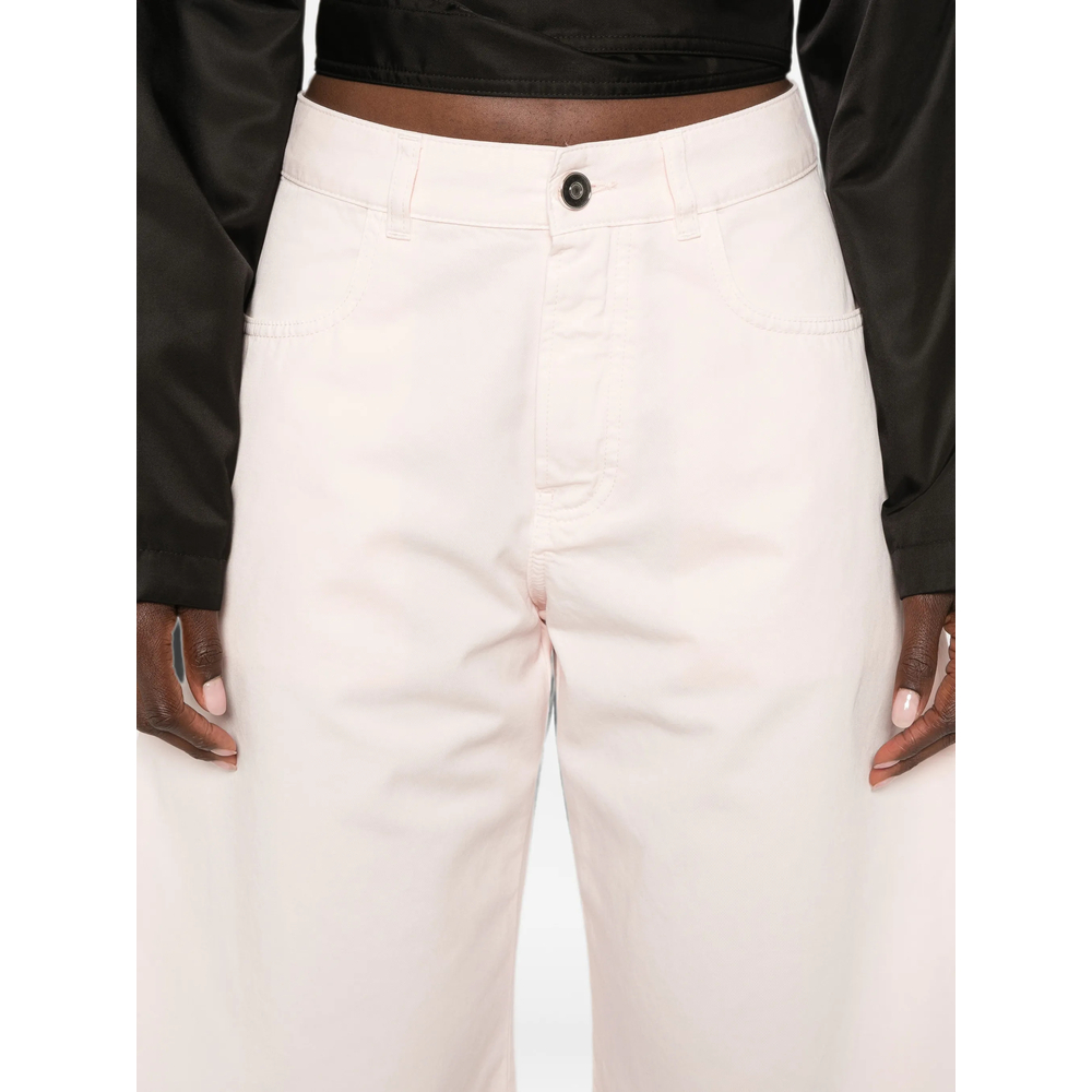 Alaïa Curved-Leg Jeans