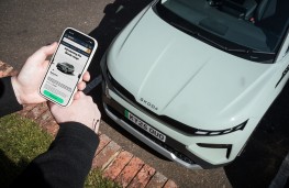 Skoda Amazon showroom, 2025, on phone