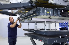 BMW iX5, 2026, flat storage system, with engineer