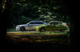 Honda Insight and silver Civic, 2024, side