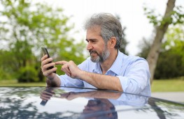 Driver using NPP parking control app