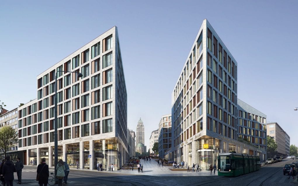 A 3D rendered image of the future housing project Lyyra. Two triangular, light concrete buildings of 7 stories, with large windows, standing on each side of the road leading up to the Kallio church further in the back. The sky is blue. There are people on the streets and a tram passing by.