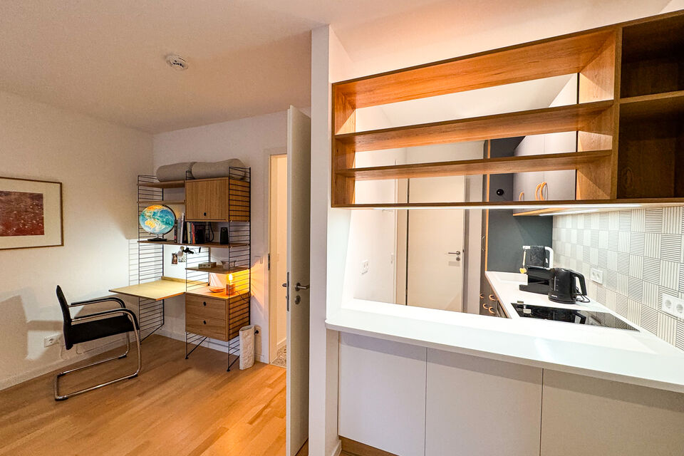 Furnished apartment, kitchen with open wooden shelving in Berlin Mitte