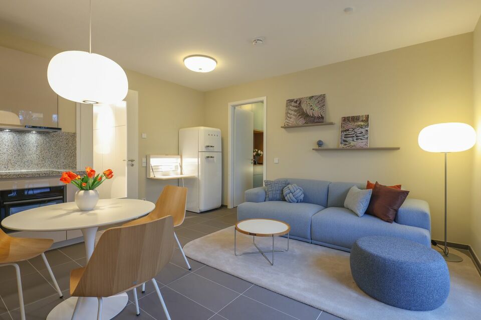 Furnished apartment, living room with modern corner sofa in Berlin Kreuzberg