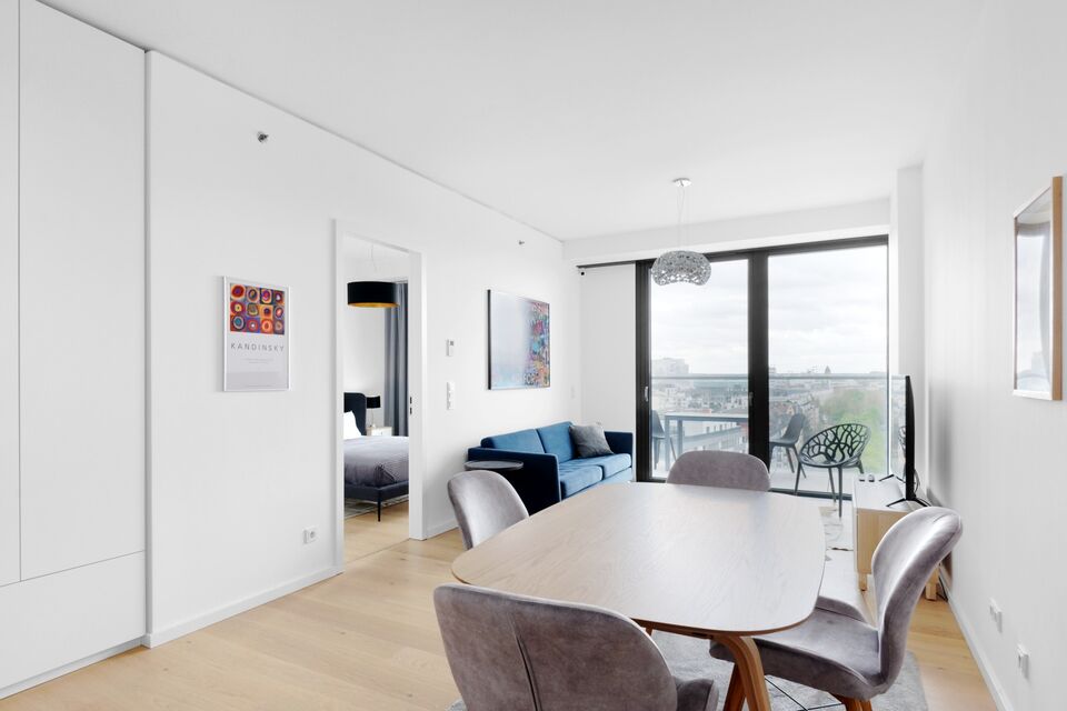 Furnished apartment, living room with panoramic windows in Frankfurt Ostend