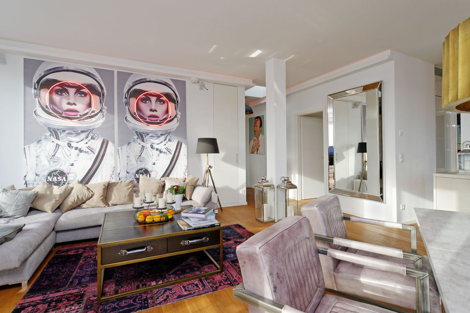 Furnished apartment, living room with astronaut artwork in Berlin Kreuzberg