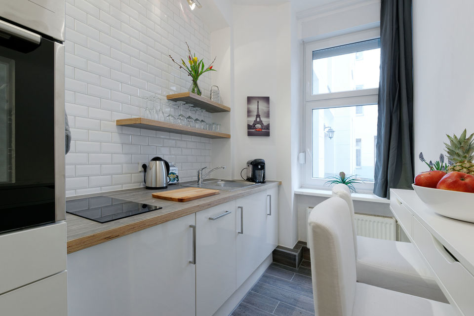 Furnished apartment, kitchen with white subway tiles in Berlin Prenzlauer Berg