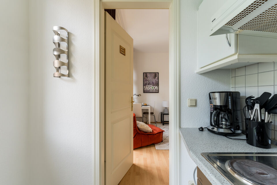 Furnished apartment, kitchen with open passage to living area in Berlin Prenzlauer Berg