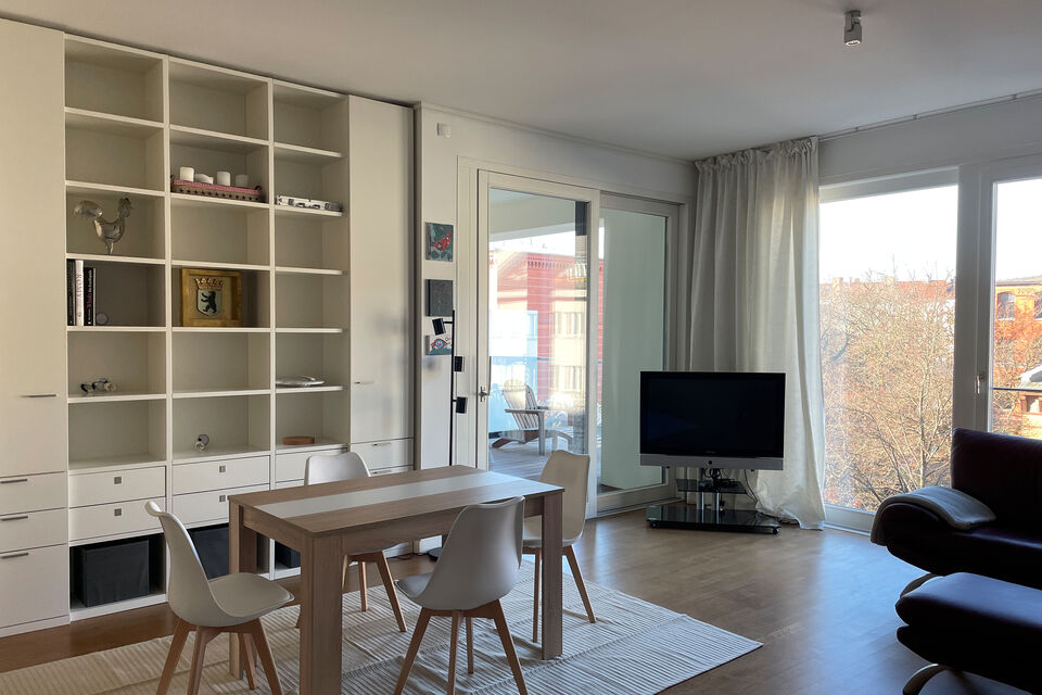 Furnished apartment, living room with built-in shelving in Berlin Prenzlauer Berg
