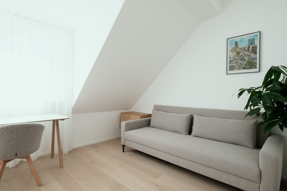 Furnished apartment, living room with sloped ceiling in Berlin Friedrichshain