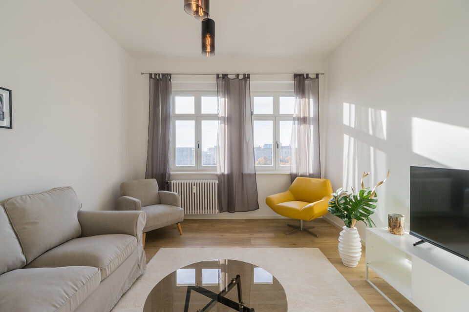Furnished apartment, living room with panoramic windows in Berlin Friedrichshain