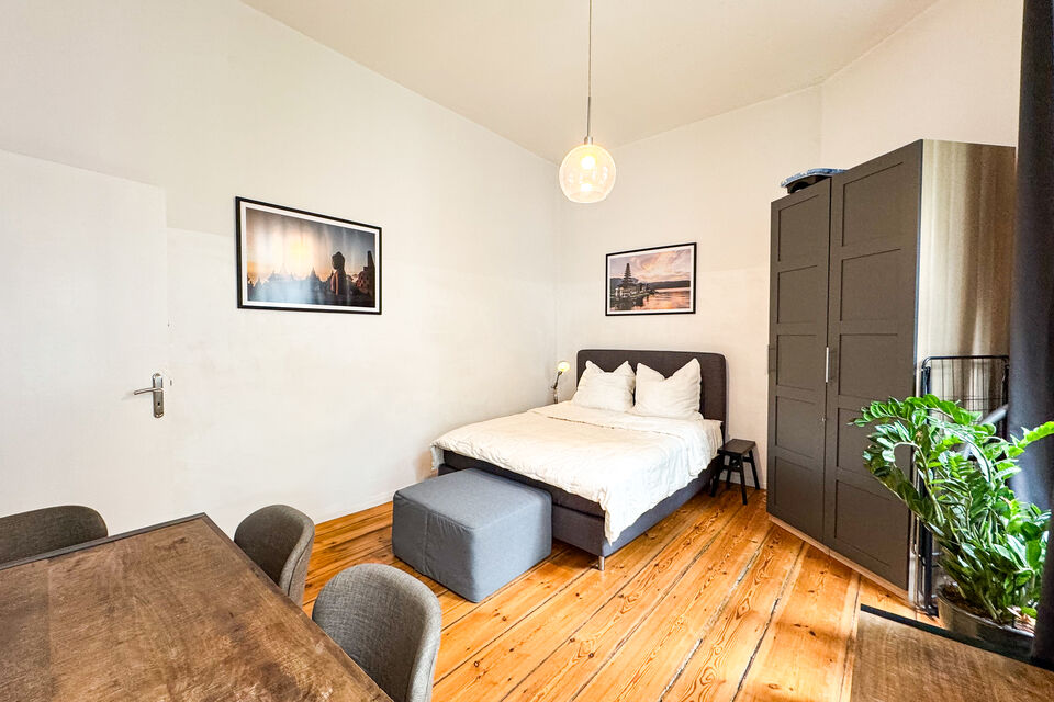 Furnished apartment, bedroom with wooden flooring in Berlin Friedrichshain