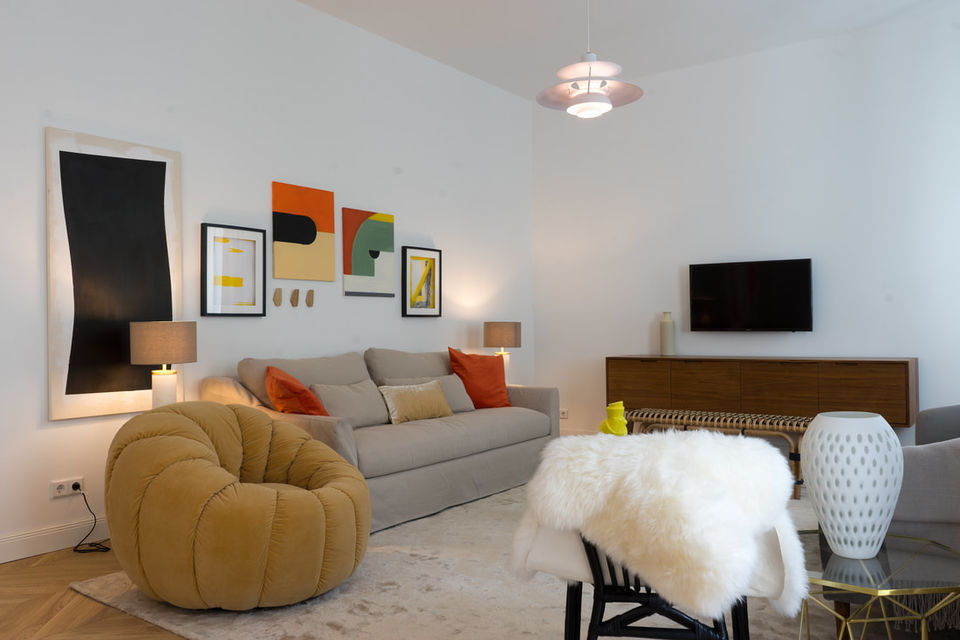 Furnished apartment, living room with designer armchair in Berlin Mitte