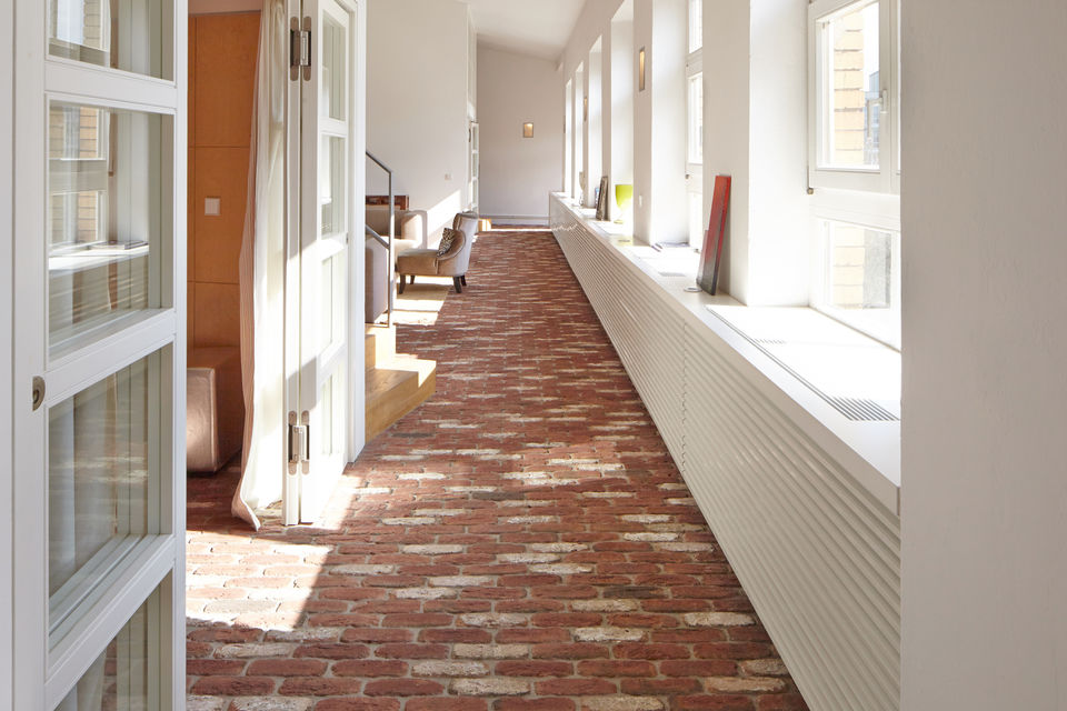 Furnished apartment, corridor with brick flooring in Berlin Friedrichshain