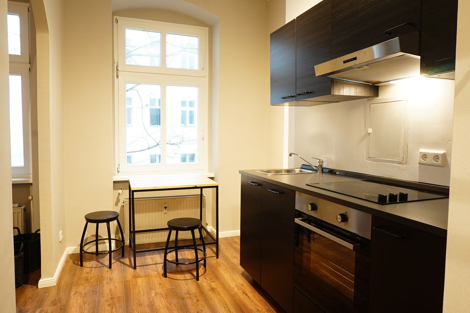 Furnished apartment, kitchen with dining area by the window in Berlin Prenzlauer Berg