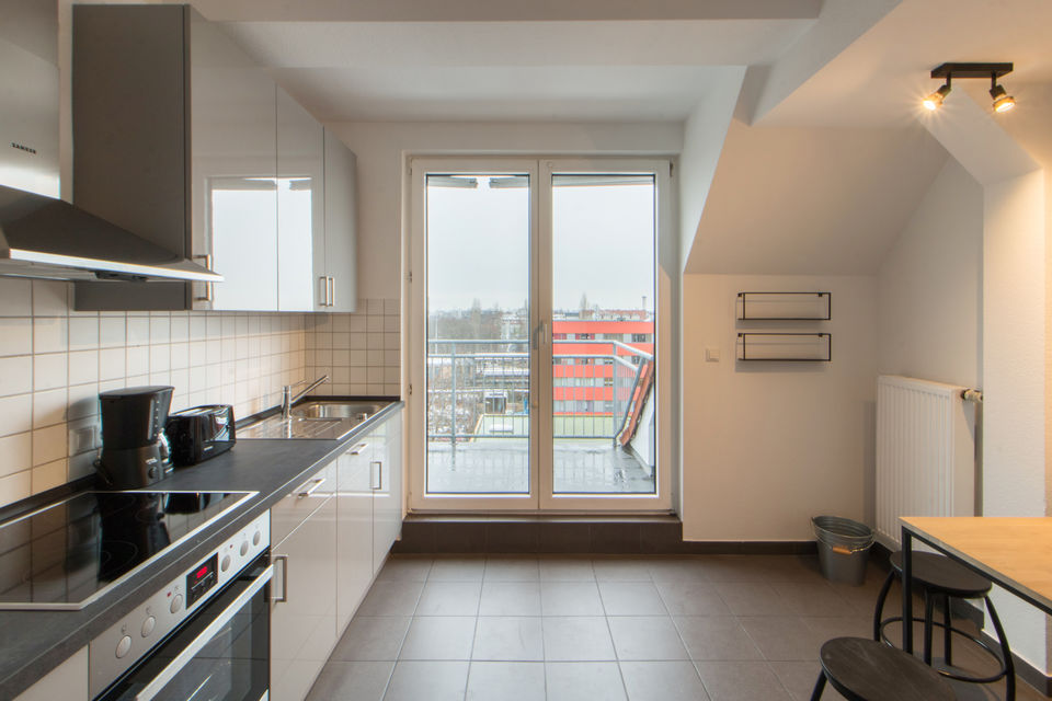 Furnished apartment, kitchen with balcony view in Berlin Kreuzberg