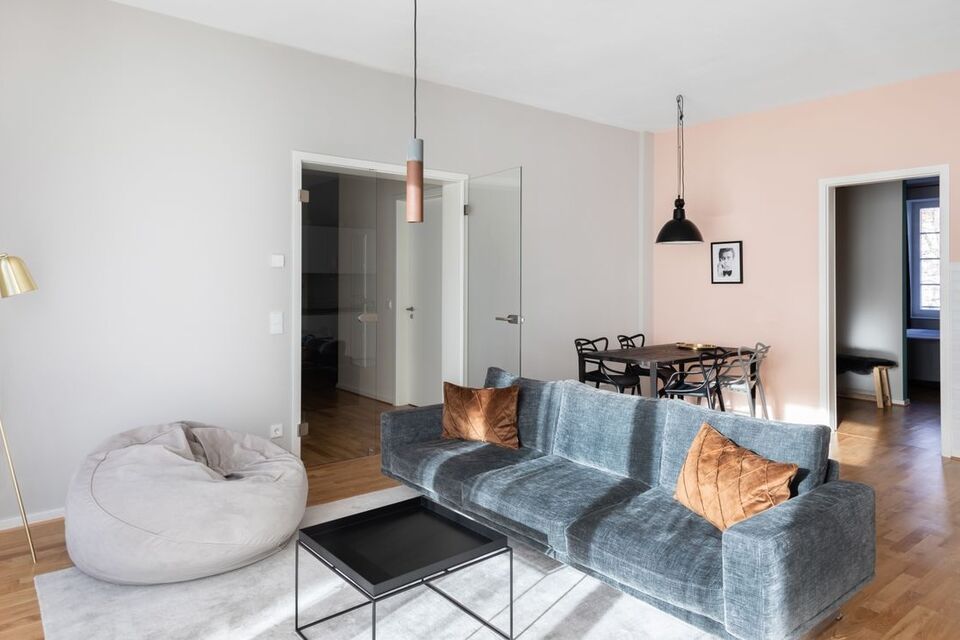 Furnished apartment, living room with designer sofa in Leipzig Gohlis