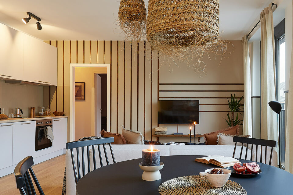 Furnished apartment, living room with wooden pendant lights in Berlin Mitte