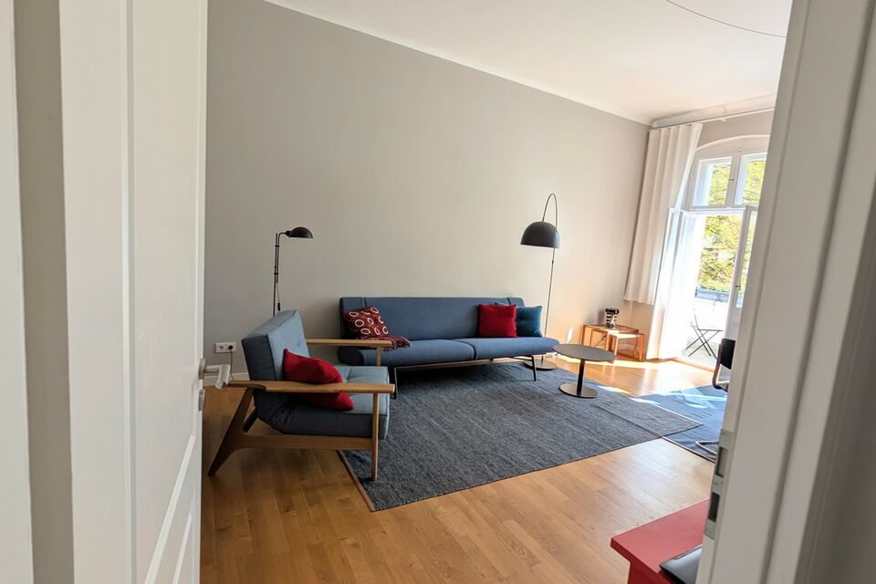 Furnished apartment, living room with designer sofa in Berlin Charlottenburg