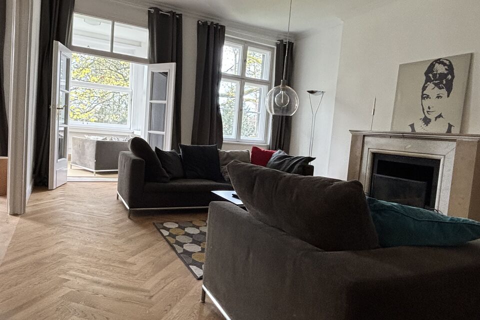 Furnished apartment, living room with fireplace in Berlin Grunewald