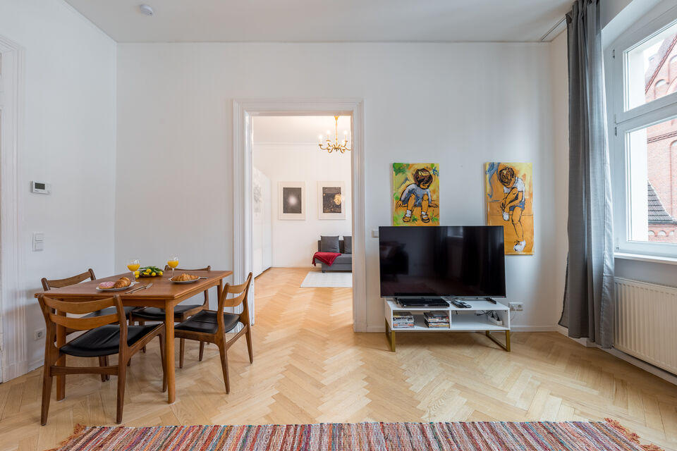 Furnished apartment, living room with wooden parquet flooring in Berlin Mitte
