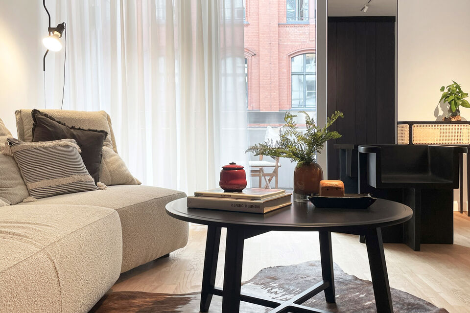Furnished apartment, living room with expansive windows in Berlin Mitte