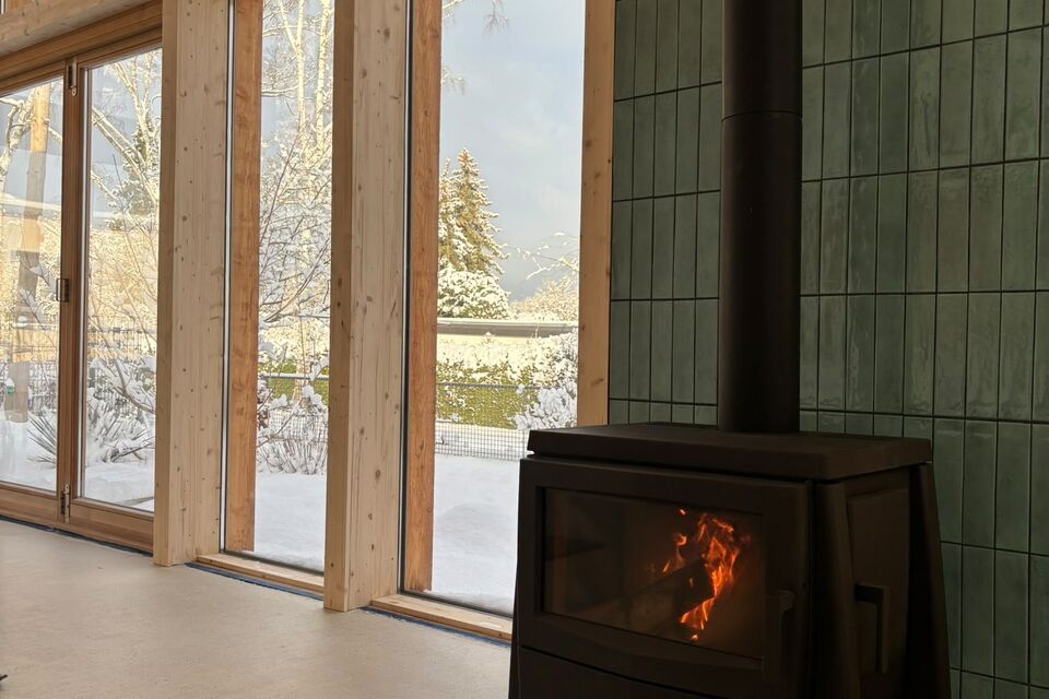 Furnished house, living room with fireplace stove in Berlin Zehlendorf