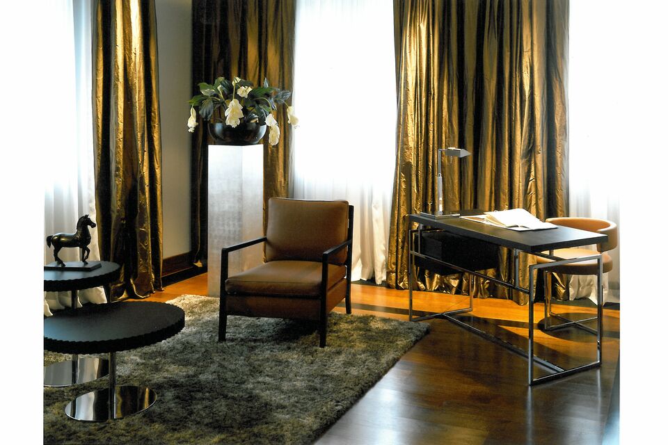 Furnished apartment, living room with gold curtains in Berlin Grunewald