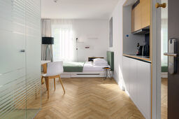 Serviced Apartment in München, Schwabing – Wohnzimmer