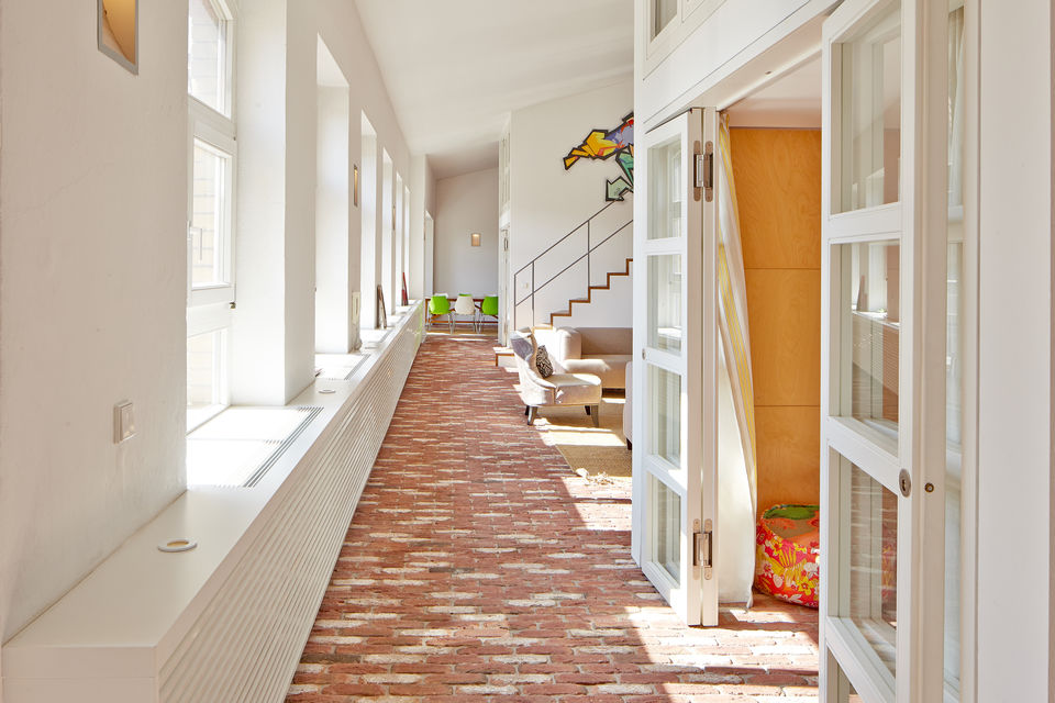 Furnished apartment, corridor with brick flooring in Berlin Friedrichshain