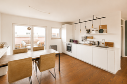 Furnished apartment, dining area and kitchen with open layout in Berlin Friedrichshain