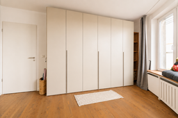Furnished apartment, bedroom with large built-in wardrobe in Berlin Friedrichshain
