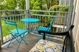 Furnished apartment, balcony with turquoise garden furniture in Berlin Prenzlauer Berg