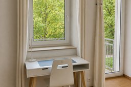Furnished apartment, bedroom with desk by the window in Berlin Prenzlauer Berg
