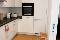 Furnished apartment, kitchen with black built-in oven in Berlin Prenzlauer Berg