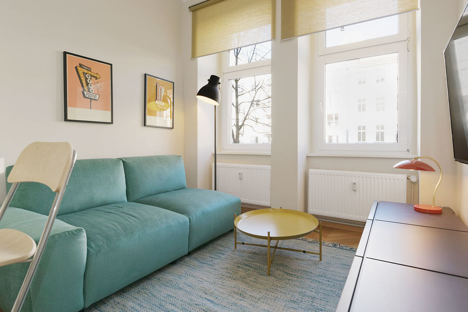 Furnished apartment, living room with designer sofa in Berlin Mitte