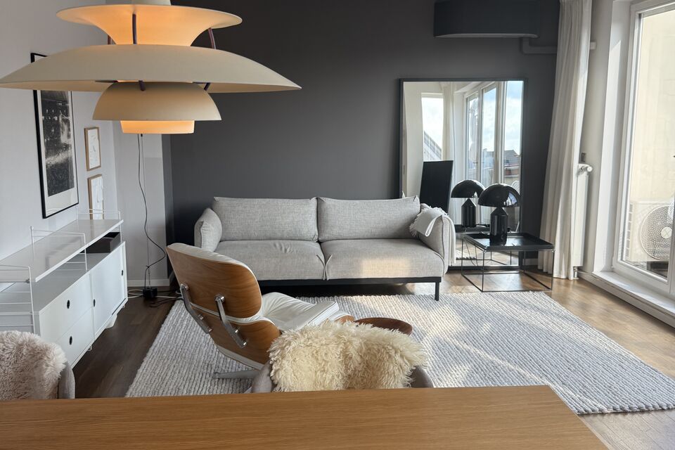 Furnished apartment, living room with designer pendant light in Berlin Prenzlauer Berg