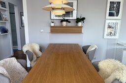 Furnished apartment, dining room with wooden table in Berlin Prenzlauer Berg