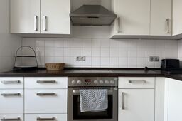 Furnished apartment, kitchen with electric stove in Berlin Prenzlauer Berg