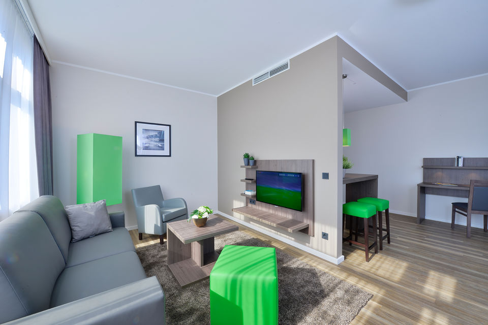 Serviced apartment, living room with open floor plan in Hamburg Groß Borstel
