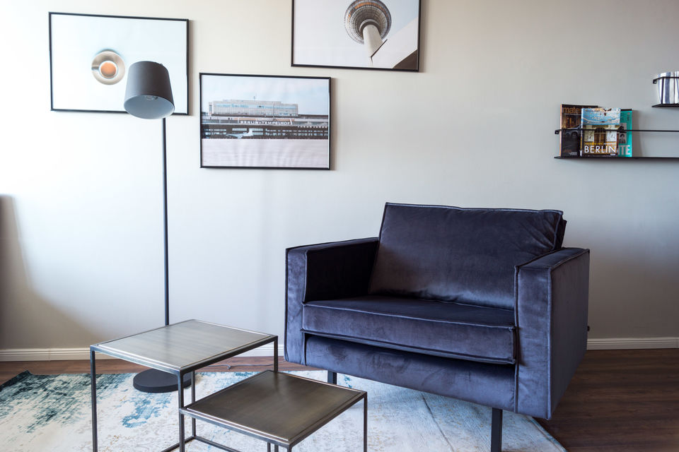 Furnished apartment, living room with velvet sofa in Berlin Mitte